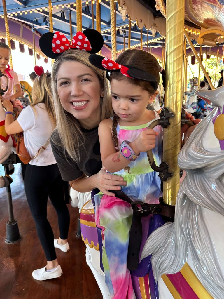 Heidi Faust with her family during a carousel ride.