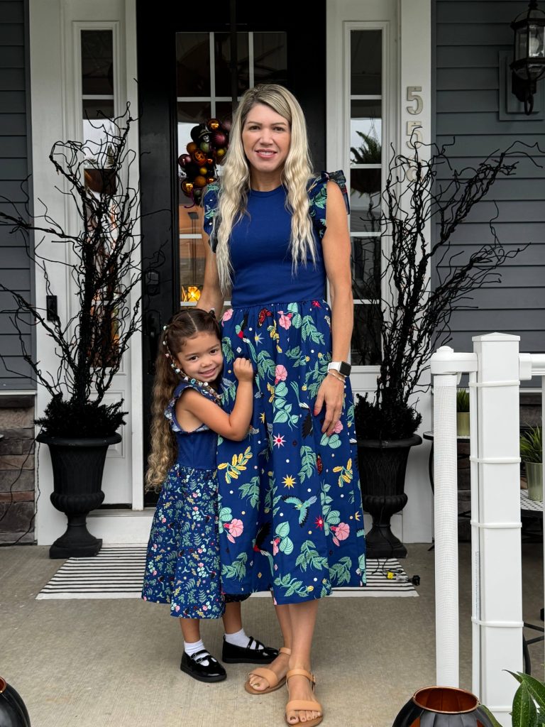 Heidi Faust with her daughter at home on the front porch.